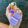 Chaveiros de frutas vibrantes transfronteiriços chaveiros de máquinas de jogo pingentes de máquina de garra pequenos presentes atacado de comércio exterior