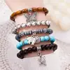 Amazon venta caliente transfronteriza pulsera de cuentas hecha a mano estilo retro para hombre pulsera de línea elástica multicapa con cuentas de madera árbol de la vida