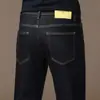 Pantalones vaqueros casuales largos de pierna recta, corte slim, de alta gama, negros, con elasticidad en cuatro direcciones para hombre, novedad otoño e invierno 2026 de Hong Kong