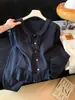 Camisa blanca dulce de estilo francés con cuello de muñeca para mujer, nueva colección de principios de otoño 2026, con corbatín y mangas largas