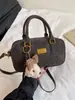 Bolso cruzado retro casual simple transfronterizo para mujer con un toque de alta gama, bolsa Boston tipo almohada versátil, diseño para el trabajo cruzado