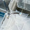 Piercing de sobrancelha em aço inoxidável com zircônia cúbica redonda, haste curva e design popular entre europeus e americanos. Ideal para piercing de sobrancelha, lábio e unha.