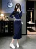 Conjunto de punto de moda estilo universitario coreano para mujer, nuevo modelo otoño e invierno 2026, top y falda, conjunto de dos piezas a la moda