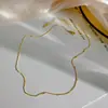 Collar fino de oro anillo liso collar que no se decolora cadena femenina cadena lisa acero de titanio cadena para la clavícula que no se decolora cadena sin colgante