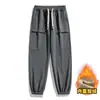 Calças masculinas de outono e inverno novas para atividades ao ar livre, à prova d'água, corta-vento e à prova de choque, unissex, forradas com fleece, espessadas, quentes, para trabalho, casuais, calças esportivas funcionais