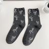 Calcetines de mujer en un pequeño montón, calcetines de seda brillante para niñas, calcetines de tubo estilo coreano con lazo estilo japonés fragante.