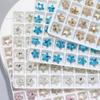 Al por mayor color para arte de uñas pequeña joyería de estrella de mar estrella de mar de moda en internet forma de diamante con base puntiaguda adornos súper brillante estrella pequeña decoración de uñas