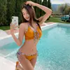 Nuevo en stock Bikini triángulo de color sólido europeo y americano Traje de baño dividido transfronterizo Venta al por mayor Traje de baño sexy para damas bikini