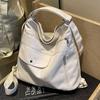 Bolsa Tote para Mulheres 2026 Nova Mochila de Grande Capacidade para o Dia a Dia Lona Versátil Bolsa de Ombro Ins Mochila de Alta Qualidade