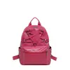 Mochila escolar grande capacidade transfronteiriça para meninas estilo japonês coreano bolsa de PU rebites bolsa de mão pequena fresh moderna