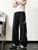 Pantalones de chándal de retazos a rayas para hombre, pantalones casuales holgados de peso pesado retro de otoño, pantalones deportivos juveniles de pierna recta ancha de moda