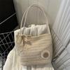 Bolso popular de este año para mujer 2023, nuevo bolso de cubo tejido a mano de moda para mujer, bolso de paja de gran capacidad