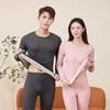 Ropa interior térmica de seda para hombre y mujer, cachemir, resistente al frío, fina, para otoño e invierno, conjunto de mallas largas