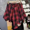 Falda asimétrica de diseño falso de dos piezas para mujer, nuevo estilo de verano 2026, falda corta de línea A a cuadros negros de moda