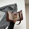 Bolso de Mujer 2025 Verano Nuevo de Gama Alta Versátil Moda Tendencia Nicho Bolso de Axila Bolso de Mano/Hombro de Moda