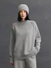 Novo suéter de cashmere puro feminino para outono e inverno, com corte solto elegante, gola semimédia alta, peça versátil para usar por baixo, suéter quente de tricô