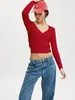 Camiseta de manga larga ajustada de color liso con cuello en V, jersey para mujer, de otoño, nueva, transfronteriza de Amazon Europa y América, con botones en la espalda, para mostrar el ombligo