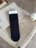 Calcetines holgados versátiles sin costuras para mujer, estilo coreano otoño e invierno para estudiantes, calcetines de media pantorrilla color blanco lechoso, calcetines largos de algodón de color liso para adolescentes