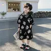 Conjunto de Camisa Floral para Vacaciones de Verano en la Playa para Niños 2026 Nuevo Fresco y Elegante Conjunto de Dos Piezas con Camisa de Manga Corta para Bebé Moderno