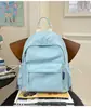 Mochila estilo ins para garota japonesa suave feminina versão coreana cor sólida versátil mochila para garota ensino fundamental ensino médio estudante