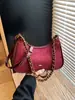 Bolso de Hombro Único Esmaltado de Alta Calidad para Mujer 2025 Otoño/Invierno Nueva Llegada Bolso de Mano Retro de Nicho Bolso Cruzado Simple y de Moda