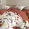 Suave y amigable con la piel, grado A, engrosado, todo algodón, cepillado, juego de cuatro piezas, algodón puro, estampado fresco, estilo de cuatro estaciones, juego de tres piezas para dormitorio