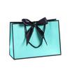 Bolsa de papel portátil con lazo de color, de fondo cuadrado, con embalaje exquisito, para regalo, ropa, compras, logotipo imprimible.