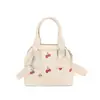 Bolso nuevo y elegante para mujeres jóvenes, perfecto para ir al trabajo.: bolsa de almohada con estampado de cerezas, bolsa de concha texturizada, bolso de hombro y bolso de axila