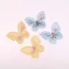 Directo de fábrica 5 cm capa única Mariposa Mágica accesorios tela pegatinas accesorios para el cabello diy material hecho a mano bordado mariposa