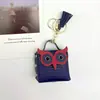 Coruja Fofa PU Bluetooth Capa de Fone de Ouvido Porta-Moedas Chaveiro Pequena Bolsa Acessórios Pingente Bolsa de Armazenamento Caixa de Fone de Ouvido