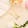 Collar de acero de titanio con flor grabada por ambos lados para mujer, cadena pequeña y exquisita para la clavícula tipo terrón de azúcar, joyería de acero de titanio
