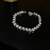 Pulsera Flor de Circonita Chapada en Oro Real Nicho Dulce Versátil Pulsera Temperamento Lujo Ligero Joyería de Gama Alta para Mujeres Al Por Mayor