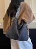 Colección nueva 2026: bolso de mano de alta gama, estilo vintage, de nicho para mujer, con una estética casual y relajada, diseño versátil, construcción ligera y gran capacidad