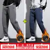 Calça de moletom casual com forro de fleece masculina outono e inverno solta com amarrilho no tornozelo roupas de inverno nova calça esportiva masculina espessa para construção