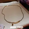 Collar Tradicional Trenzado Negro y Dorado con Dijes de Sonrisa y Piedra Ojo de Tigre, Nuevo Estilo Chino Conjunto de Collares de Monedas de los Cinco Emperadores Hielo Triturado