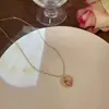 Amor fruta pêssego rosa com colar de pérolas feminina nova corrente clavicular design de nicho fofo acessórios de estudante