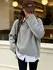 Suéter feminino de comércio exterior transfronteiriço, novo estilo outono e inverno, pulôver de caimento solto com barra fenda, suéter de tricô, top casual e versátil