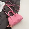 Bolso coreano de nicho con estampado de lichi en color dopamina, casual y simple, versátil y elegante, adecuado para ir al trabajo, bolso cruzado para mujer