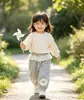 Pantalones de chándal con cintura de encaje para bebé niña, pantalones elásticos con puños acanalados, volantes de encaje con lazo, pantalones versátiles para niñas