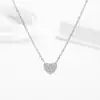Collar con Anillo de Corazón Full Diamante de Acero de Titanio para Mujer Lujo Ligero Sentido de Diseño de Nicho Cadena para Clavícula Amor de Ángel Colgante Elegante para Mujer