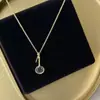 Colgante de Llave con Lupa Estilo Vintage, Collar Largo Bicolor Dorado y Plateado Moderno y Versátil, Collar para Suéter con Diseño de Nicho