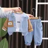 Otoño 2026 Nuevo Conjunto de Tres Piezas de Manga Larga de Mezclilla con Parches y Logo de Letras para Niños Ropa de Manga Larga para Bebé Moda al por Mayor