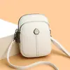 Nueva bolsa cruzada minimalista para teléfono transfronteriza con textura de cuero genuino, múltiples compartimentos, ligera, adecuada para el transporte diario, bolso de hombro estilo francés con temática de bosque para mujer