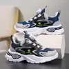 Zapatos para Niños 2026 Nuevos de Verano Transpirables Malla Simple Superficie de Malla Niños Medianos y Grandes Botón Giratorio Zapatos Deportivos para Niños