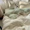 Juego de ropa de cama de textiles para el hogar de Nantong, juego de cuatro piezas, sábana de algodón lavado amigable con la piel, funda de edredón, sábana bajera, juego de tres piezas para camas de dormitorios estudiantiles
