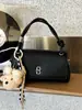 Bestseller Transfronteiriço Estilo Coreano Simples Bolsa Transversal com Pingente de Urso Feminina 2026 Nova Bolsa de Mão/Ombro de Moda de Alta Qualidade