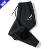 Pantalones de cachemira para otoño e invierno 2021, versión coreana para hombre, pantalones gruesos y cálidos para hombre, talla grande, pantalones de punta para hombre, disponibles al por mayor