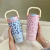 Novo copo térmico com opções duplas de bebida, caneca de café estilosa para mulheres, garrafa de água com estampa de leopardo, bonito e portátil