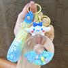 Creativo aceite Llavero de dona de frijol de azúcar coolomi anillo de natación de arena movediza llavero de llave de coche pequeño regalo al por mayor