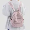 Mochila de Moda Casual Color Sólido Estilo Coreano Ligera para Viajes Campus Escuela Gran Capacidad Mochila para Estudiantes Venta al por Mayor